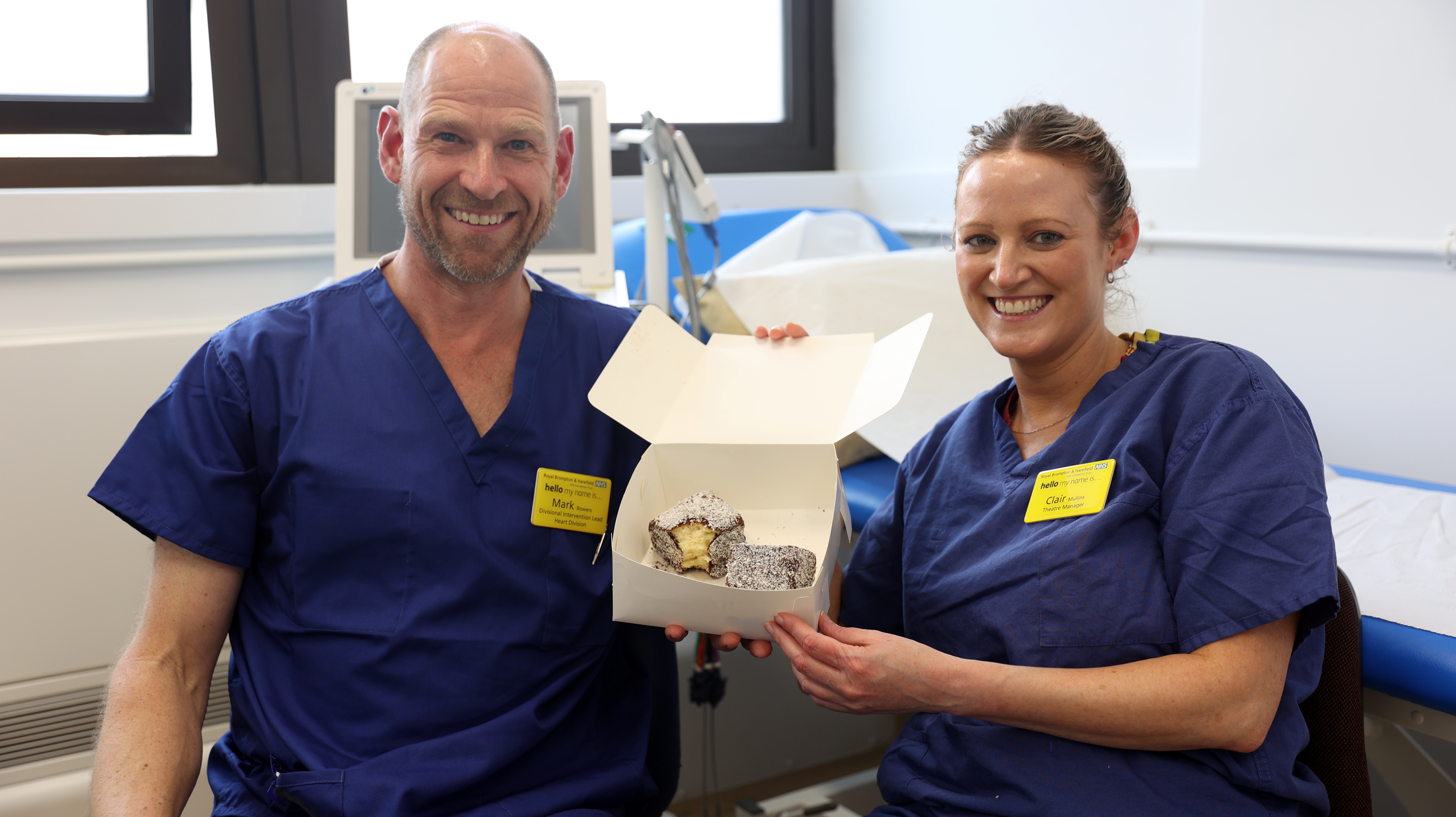 Mark Bowers and Clair Mullins with a box of lamingtons