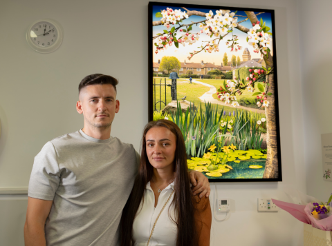 Danny and Demi Keenan with the bespoke artwork in Royal Brompton Hospital