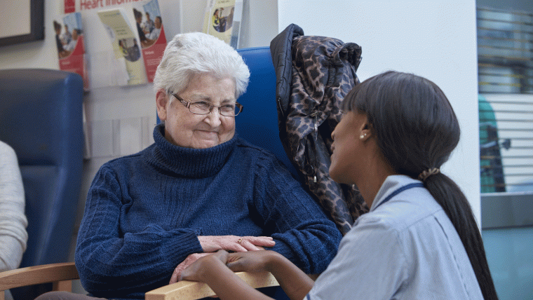 Elderly patient with a nurse